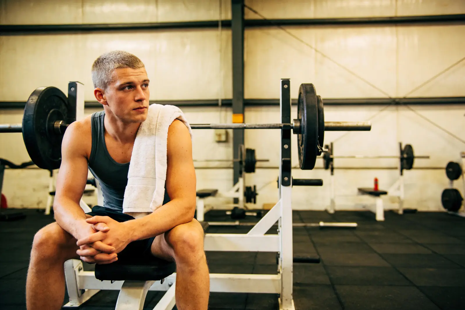 A young man back at the gym, functional and steady, after catching a problem early