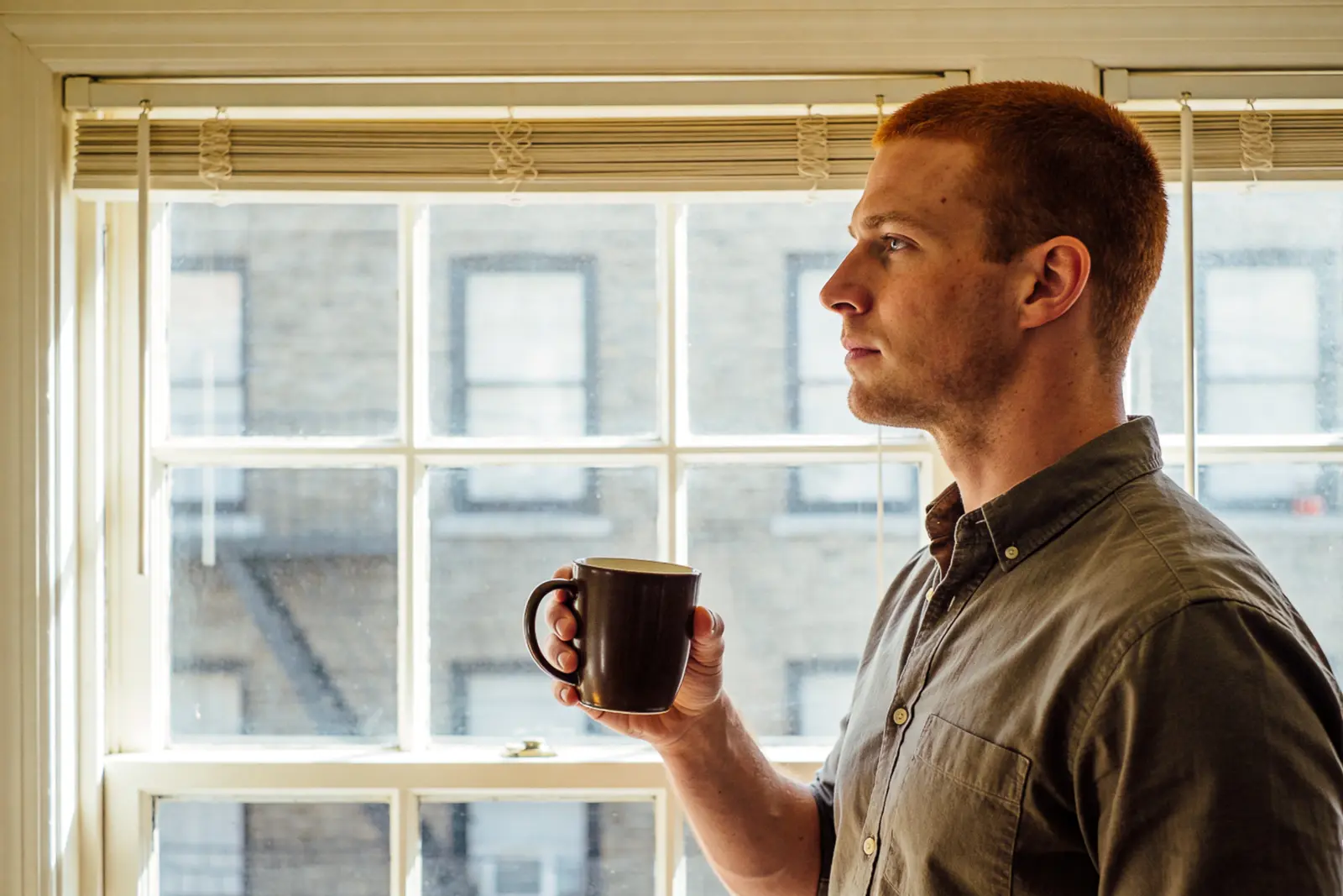 Man making a deliberate everyday choice at home on a quiet weekday morning