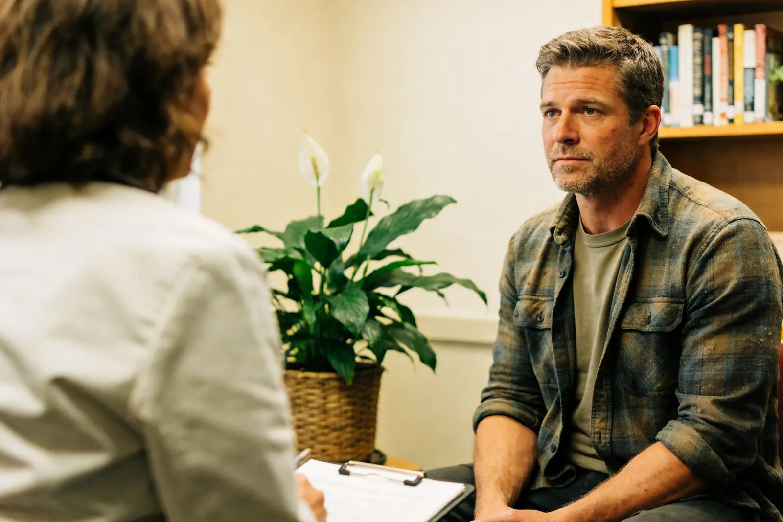 Long unhurried intake conversation between a man and his clinician