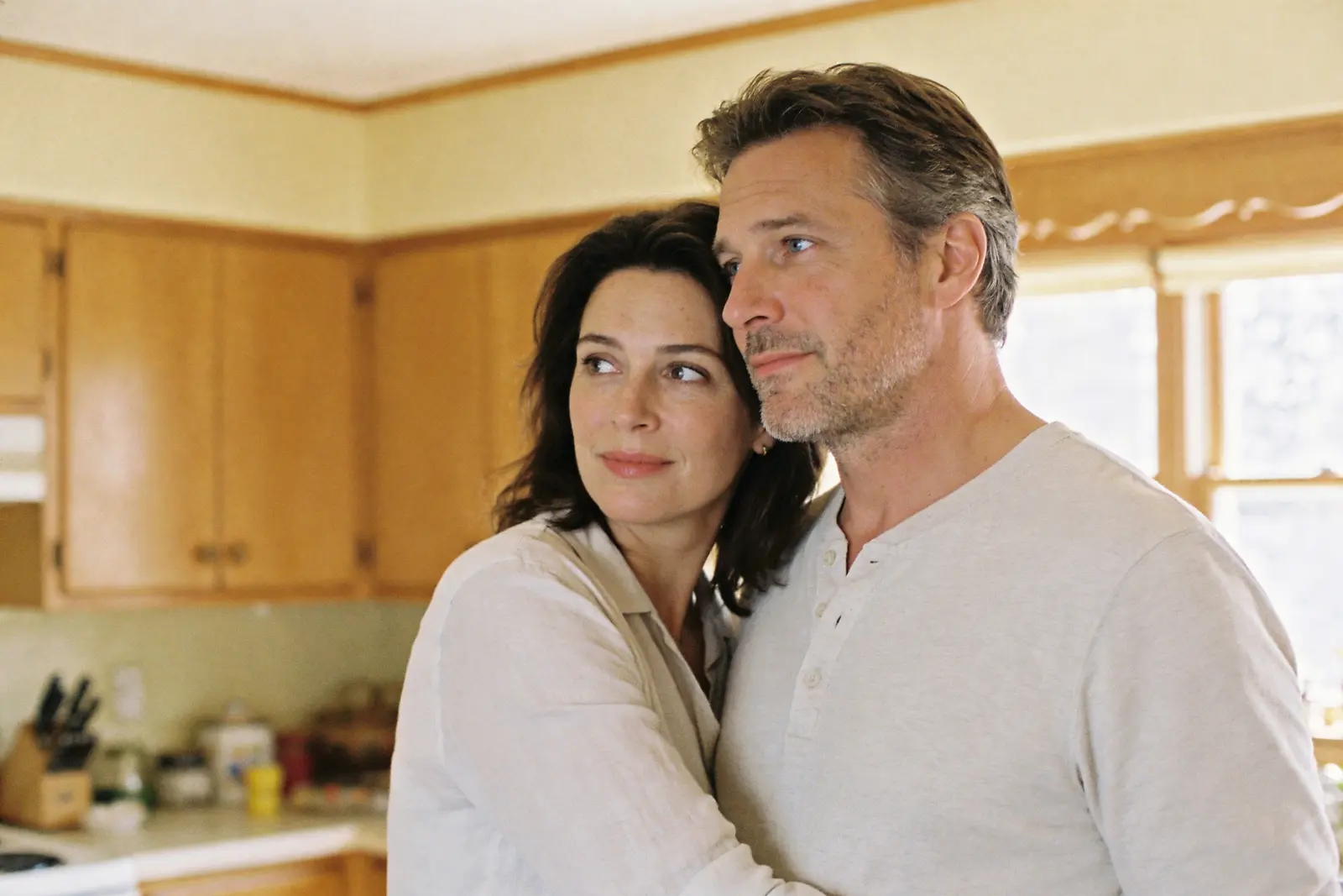 Relaxed couple close together at home in the morning